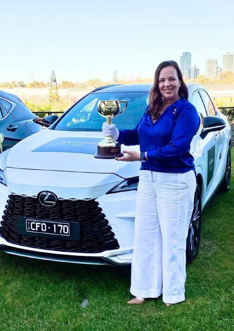 Dolly's Dream Founder Kate Everett with the Melbourne Cup, which will be visiting Katherine in July. 