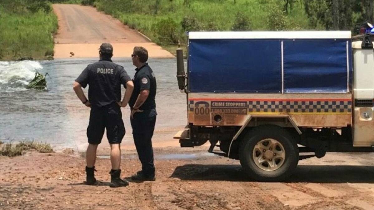 NT police at a creek crossing near Peppiminarti. Picture by NT Police. 